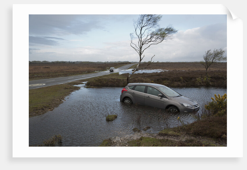 Ford Focus in flooded ditch after losing control on wet road 2012 by Unknown