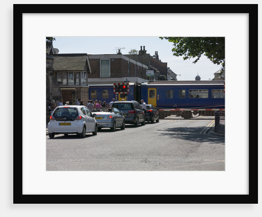 Train passing through level crossing in Lincoln 2014 by Unknown