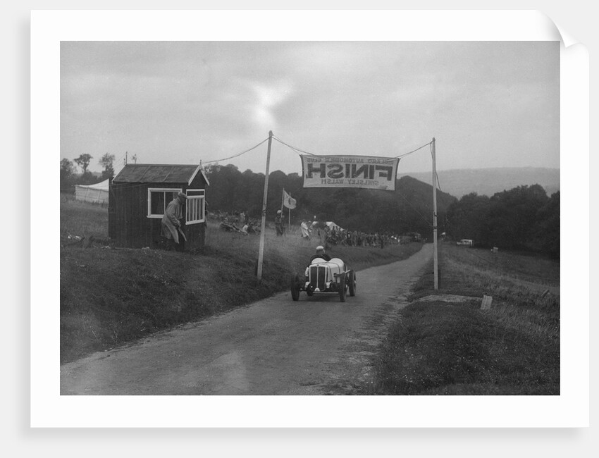 Car crossing the finishing line at the MAC Shelsley Walsh Speed Hill Climb, Worcestershire, 1935 by Bill Brunell