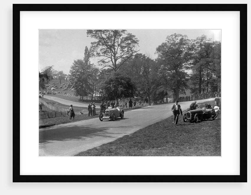 MG J2 passing the crashed Austin 7 of B Sparrow, Donington Park Race Meeting, Leicestershire, 1933 by Bill Brunell
