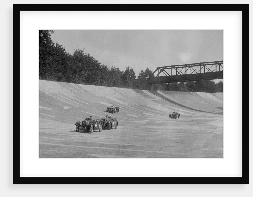 Singers of TW Fassett and Alf Langley and an MG racing at a MCC meeting, Brooklands, Surrey, 1933 by Bill Brunell