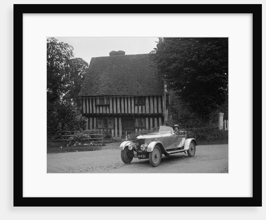 Two women in a AC motor car in front of a Tudor house, c1930s by Bill Brunell