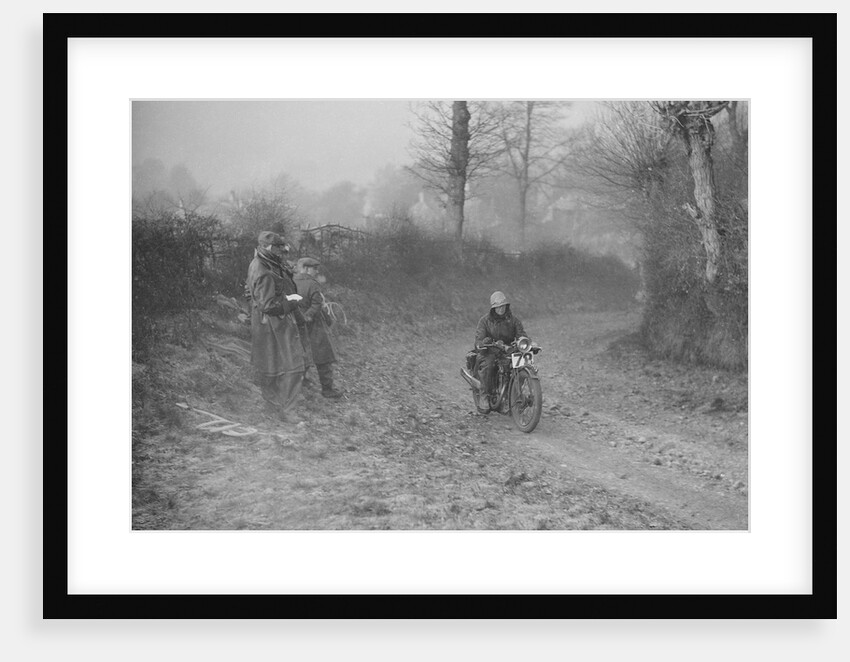 Woman riding a Royal Enfield motorcycle in the Gloucester Trial, c1930s by Bill Brunell