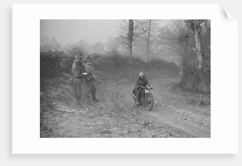 Woman riding a Royal Enfield motorcycle in the Gloucester Trial, c1930s by Bill Brunell