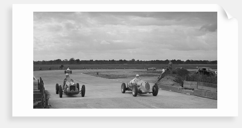 Two MGs racing at Brooklands, Surrey, c1930s by Bill Brunell