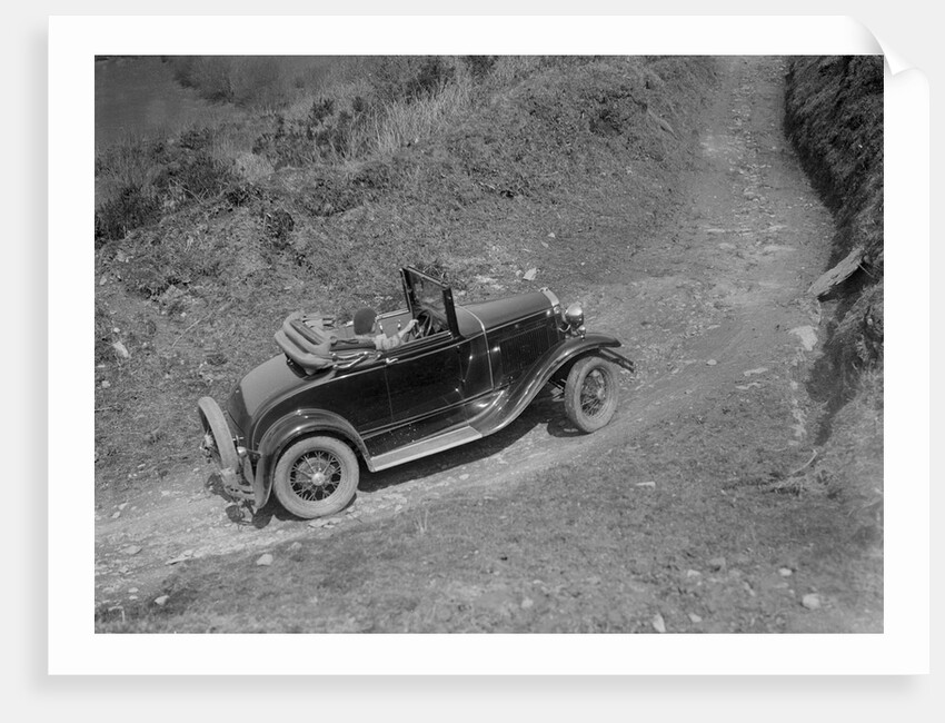Kitty Brunell driving a 1930 2-seater Ford Model A, 1931. by Bill Brunell