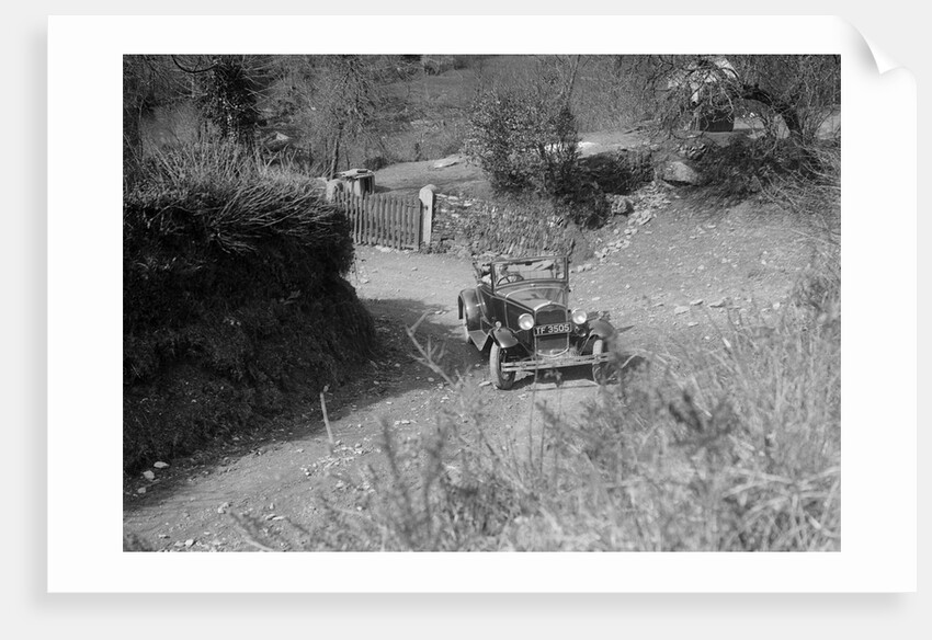 Kitty Brunell driving a 1930 2-seater Ford Model A, 1931. by Bill Brunell