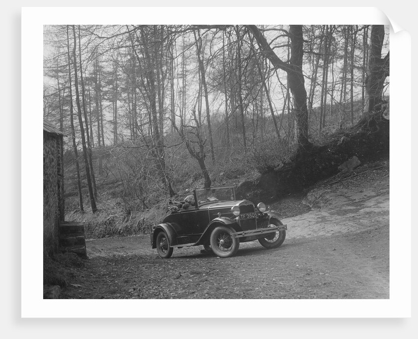 Kitty Brunell driving a 1930 2-seater Ford Model A, 1931. by Bill Brunell