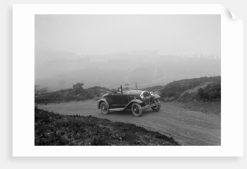Kitty Brunell driving a 1930 2-seater Ford Model A, 1931. by Bill Brunell