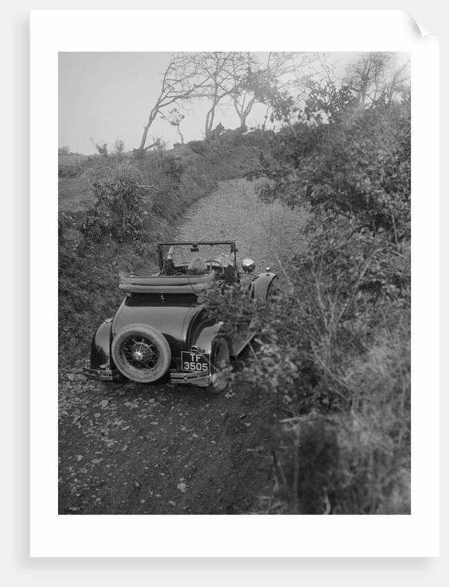 Kitty Brunell driving a 1930 2-seater Ford Model A, 1931. by Bill Brunell