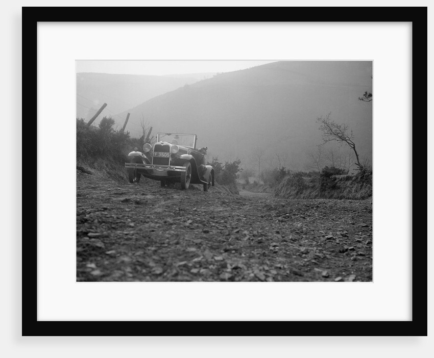 Kitty Brunell driving a 1930 2-seater Ford Model A, 1931. by Bill Brunell