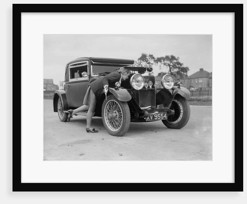 Kitty Brunell looking under the bonnet of a Talbot 14/45 sportsman's coupe, c1928 by Bill Brunell
