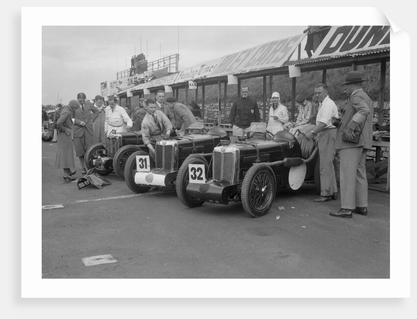 Three MG C type Midgets in the pits at the RAC TT Race, Ards Circuit, Belfast, 1932 by Bill Brunell