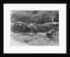 People relaxing by a signpost with a 1935 Standard 10 hp car, Devon, (c1935?) by Unknown