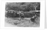 People relaxing by a signpost with a 1935 Standard 10 hp car, Devon, (c1935?) by Unknown