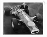 Graham Hill and Colin Chapman with Lotus 49, 1967 by Unknown
