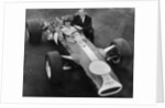 Graham Hill and Colin Chapman with Lotus 49, 1967 by Unknown