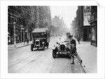 A Rover 1928 10/25 HP sports car parked in a London street, 1931 by Unknown
