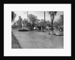 A Pontiac and a Willy's in a flood, USA, c1941 by Unknown