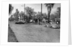 A Pontiac and a Willy's in a flood, USA, c1941 by Unknown