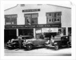 1932 Ford V8 in front of a car showroom, (c1932?) by Unknown