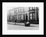 An 'Orderly Boy' and his cart sweeping a street, Liverpool, 1935 by Unknown