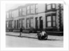 An 'Orderly Boy' and his cart sweeping a street, Liverpool, 1935 by Unknown