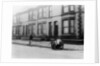 An 'Orderly Boy' and his cart sweeping a street, Liverpool, 1935 by Unknown