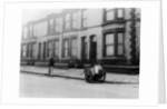 An 'Orderly Boy' and his cart sweeping a street, Liverpool, 1935 by Unknown
