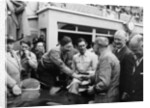 Peter Whitehead being congratulated on his victory with Peter Walker of the Le Mans 24 hours, 1951 by Unknown