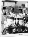 John Watson and Jan Lammers waving at the crowds at Jarama, Spain, 1987 by Unknown