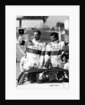 John Watson and Jan Lammers waving at the crowds at Jarama, Spain, 1987 by Unknown