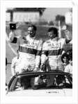 John Watson and Jan Lammers waving at the crowds at Jarama, Spain, 1987 by Unknown
