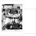 John Watson and Jan Lammers waving at the crowds at Jarama, Spain, 1987 by Unknown