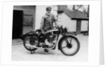 Donald Campbell outside a garage at Headley Grove, Surrey, 1938 by Unknown