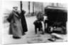 Lord Northcliffe's chauffeur changing a tyre, (c1908?) by Unknown
