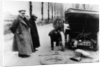 Lord Northcliffe's chauffeur changing a tyre, (c1908?) by Unknown