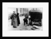 Lord Northcliffe's chauffeur changing a tyre, (c1908?) by Unknown