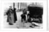 Lord Northcliffe's chauffeur changing a tyre, (c1908?) by Unknown