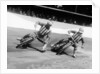 Dick Bradley (on the left) and Alby Golden at a speedway track by Anonymous