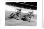 Dick Bradley (on the left) and Alby Golden at a speedway track by Anonymous