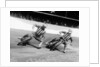 Dick Bradley (on the left) and Alby Golden at a speedway track by Anonymous