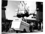 Unloading trailers from a ship, (c1950s?) by Unknown