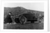 A woman picnicking next to her air-cooled Rover 8, c1919-c1925 by Unknown