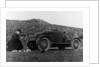 A woman picnicking next to her air-cooled Rover 8, c1919-c1925 by Unknown