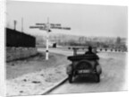 Car near a road sign, Bromley, Kent, 1920s by Unknown