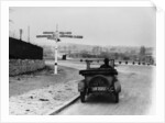 Car near a road sign, Bromley, Kent, 1920s by Unknown