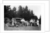 A group of people on an outing with their cars, c1929-c1930 by Unknown