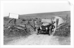 A Morris Bullnose driving through a gateway, early 1920s by Unknown