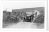 A Morris Bullnose driving through a gateway, early 1920s by Unknown